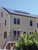 Solar roof in Jamaica Plain: Tobias Johnson's home gets plenty of sun exposure.